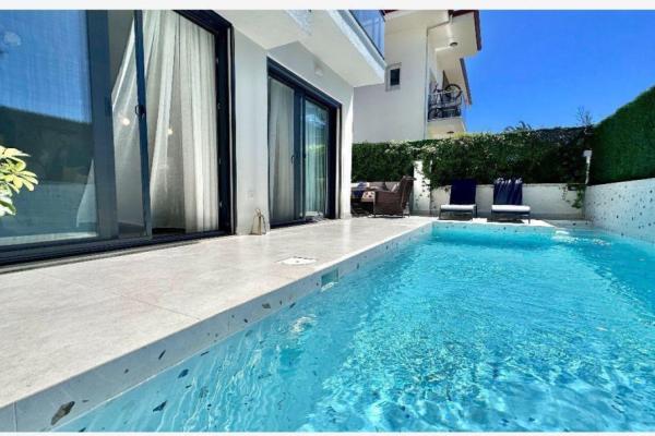 Fethiye’nin nezih noktasında satılık bitişik nizam villa YÜKSEK KİRA GETİRİSİ